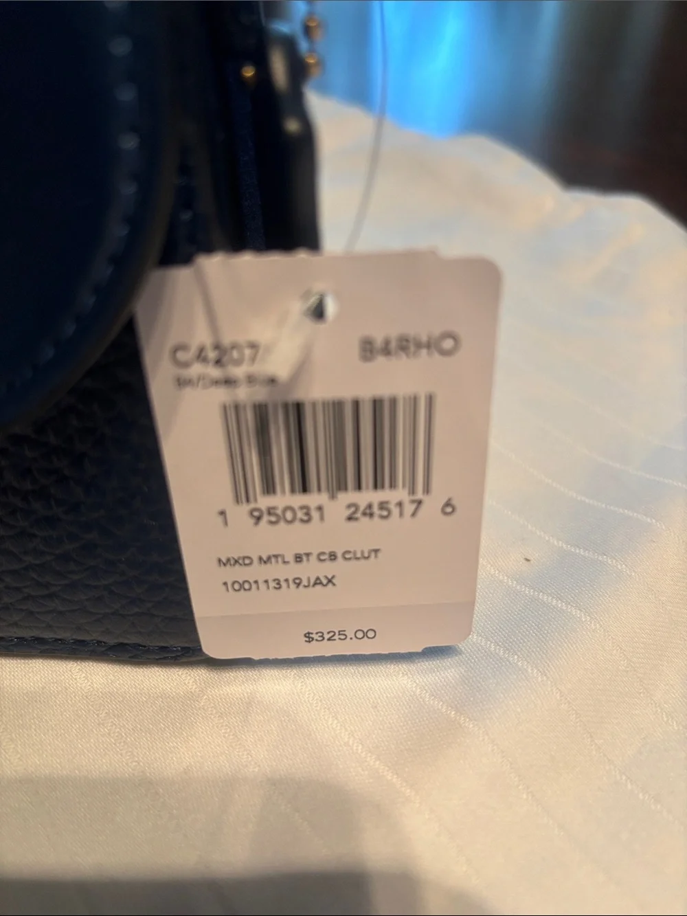 Coach sleek leather